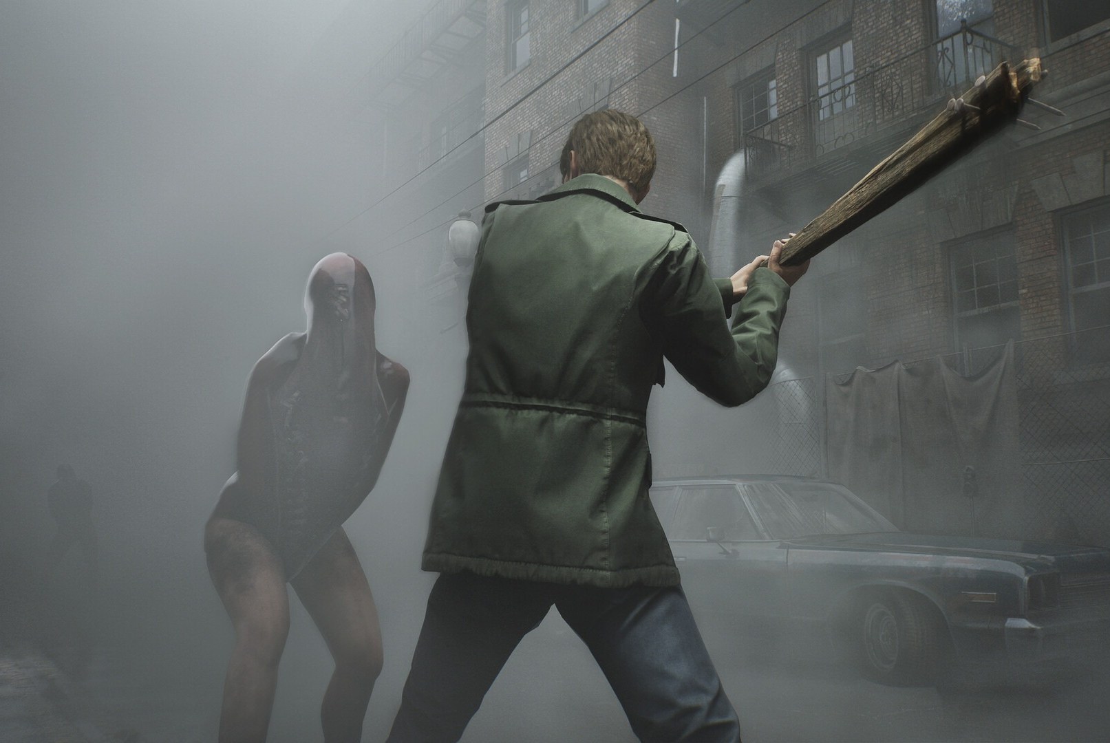 James, the main character of Silent Hill 2, swings a baseball bat in the face of an approaching mannequin monster