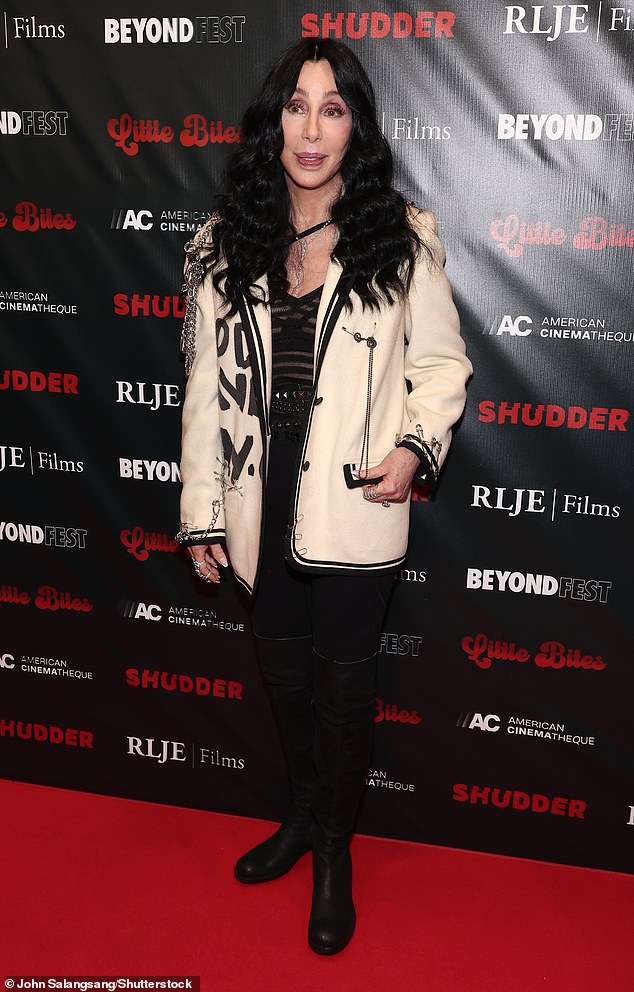 Cher, 78, showed off her seemingly ageless face as she posed in a chic outfit before heading to the screening.