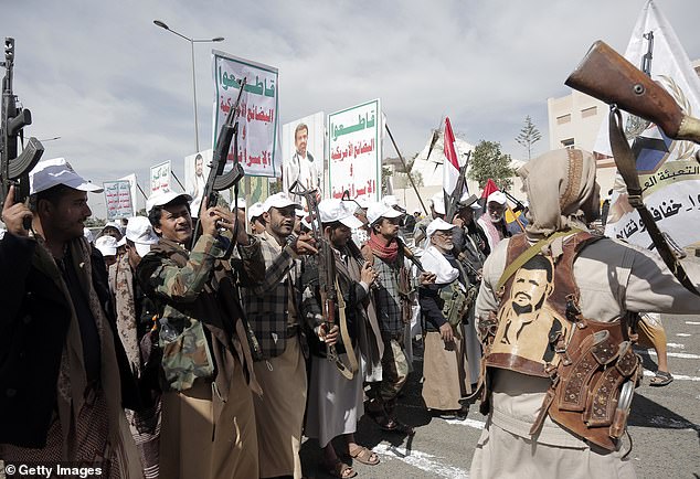 Yemeni tribesmen belonging to the Houthi movement take part in a popular parade and rally in support of the Palestinians and against the US-British airstrikes on Yemen on February 7, 2024 in Sana'a, Yemen