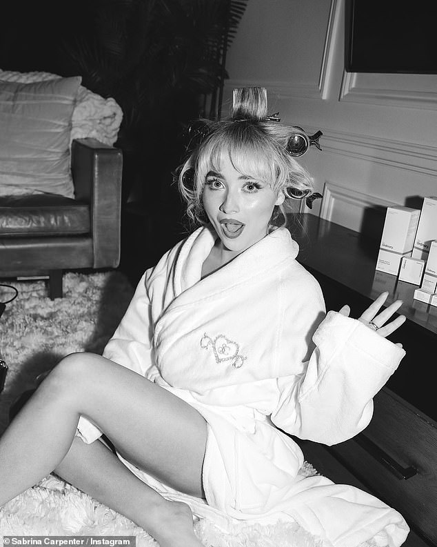 In another photo, Sabrina posed in a bathrobe as she got ready