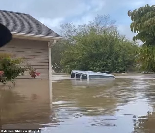 The camera pans around to show the exterior of the building, which, like the interior, is devastatingly flooded