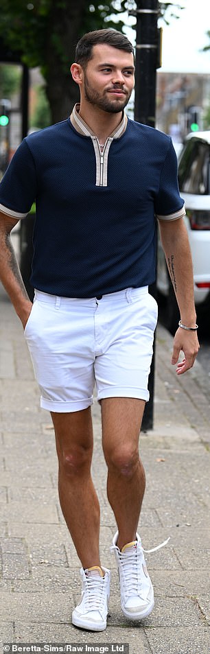 While Joe opted for a tight navy blue polo shirt and white shorts