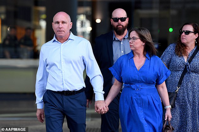 Brother Ian Cabrie (left) and best friend Cameron Thomas (second from left) leave to address the media outside the High Court in Brisbane on Friday