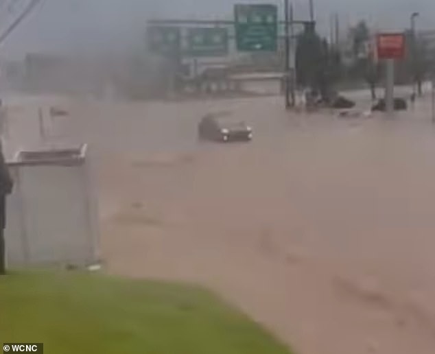 The murky water flooded the roads, causing motorists to change directions or abandon their vehicles