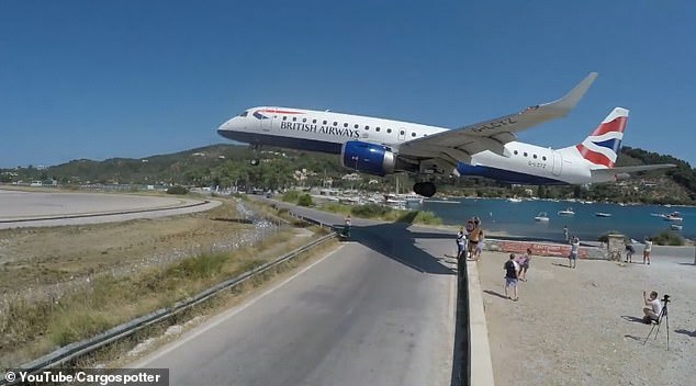 A BA flight landing at Skiathos. The Greek island's airport is notoriously difficult to land and has been the site of many dramatic landings over the years