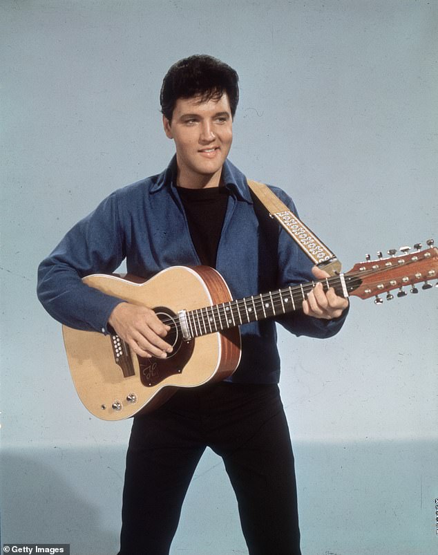 Elvis Presley with a twelve-string guitar in 1955