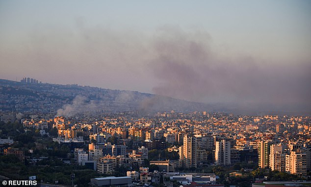 Smoke rises over the southern outskirts of Beirut and surrounding areas, amid ongoing hostilities between Hezbollah and Israeli forces, as seen from Sin El Fil, Lebanon, October 4, 2024