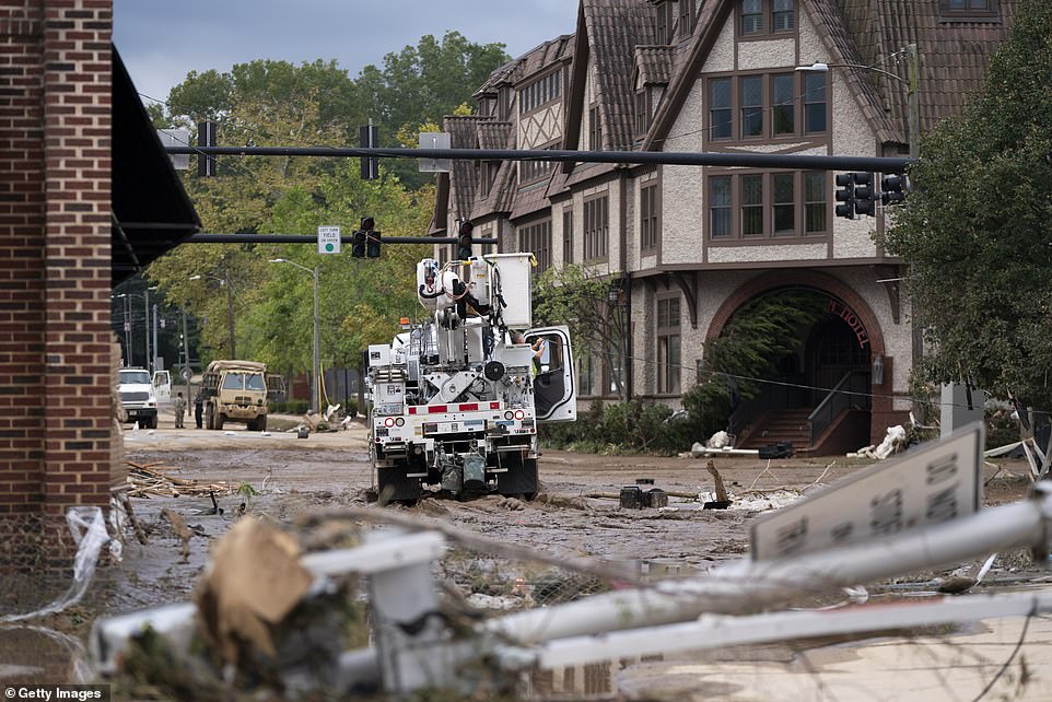 Cleanup crews continue to work on the damaged site. The roads to Biltmore Village are now filled with mud and debris