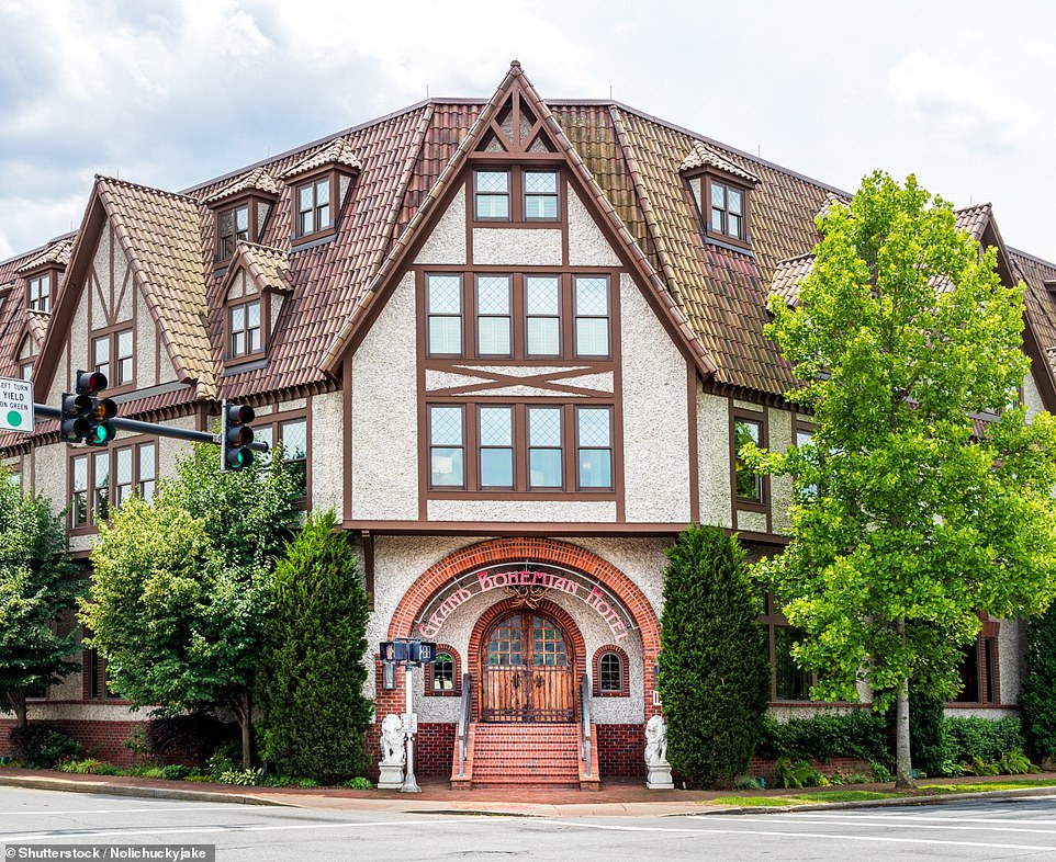 The iconic Biltmore Village has been a tourist attraction for decades. Upstairs, in front of Helene