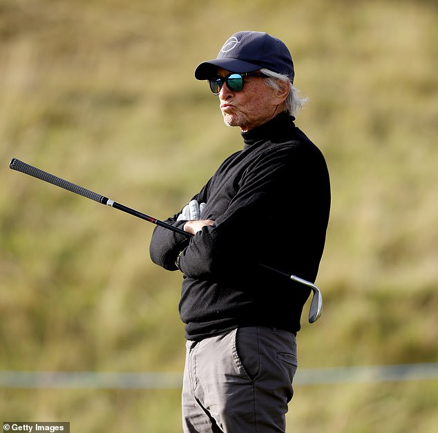 Michael Douglas appeared to be in better spirits than on Thursday when he was spotted with his head in his hands