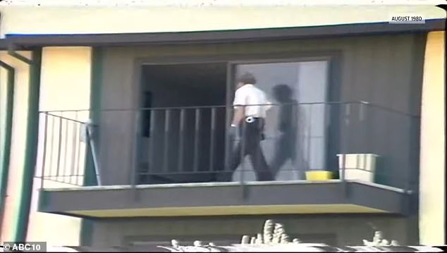 A police officer stands outside Helen Terry's apartment complex on Wyndham Drive in Sacramento