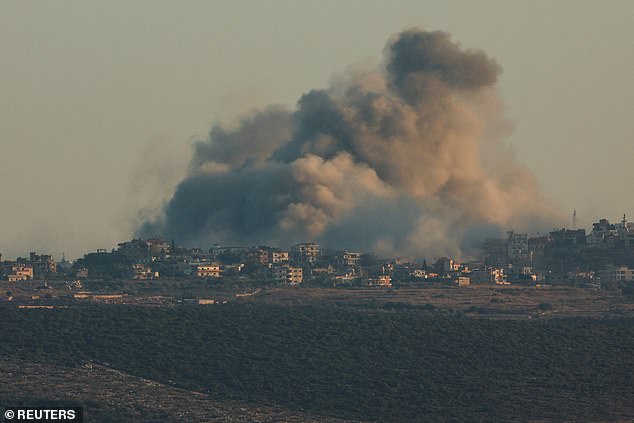 Smoke rises amid ongoing hostilities between Hezbollah and Israeli forces, seen from Tyre, southern Lebanon on October 4