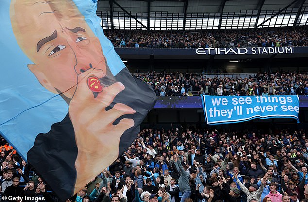 The banner, organized by the 1894 Group, should encourage Guardiola to stay at the club