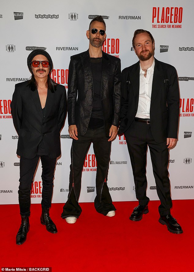 Robbie explained that the alternative band, consisting of singer Brian Molko (left) and bassist/guitarist Stefan Olsdal (middle), had a big impact on him