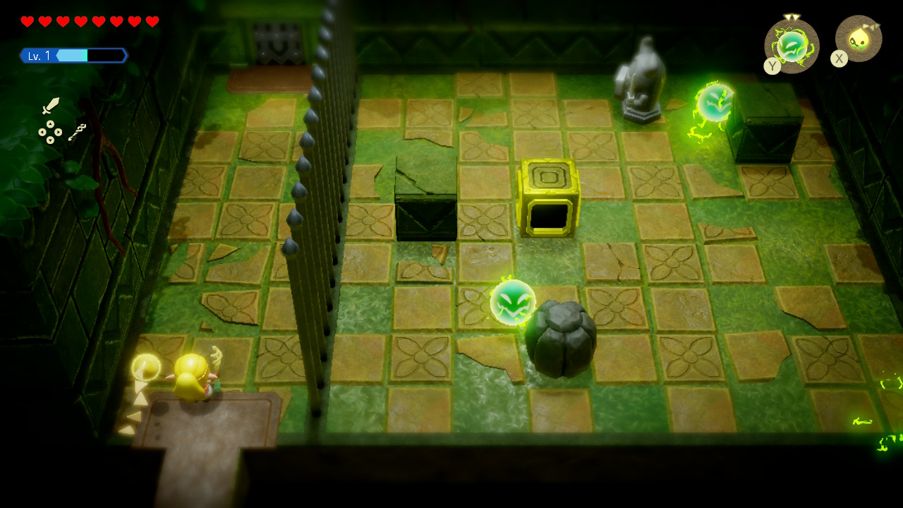 Zelda enters a room with metal bars and a boulder in the Hidden Ruins in Echoes of Wisdom