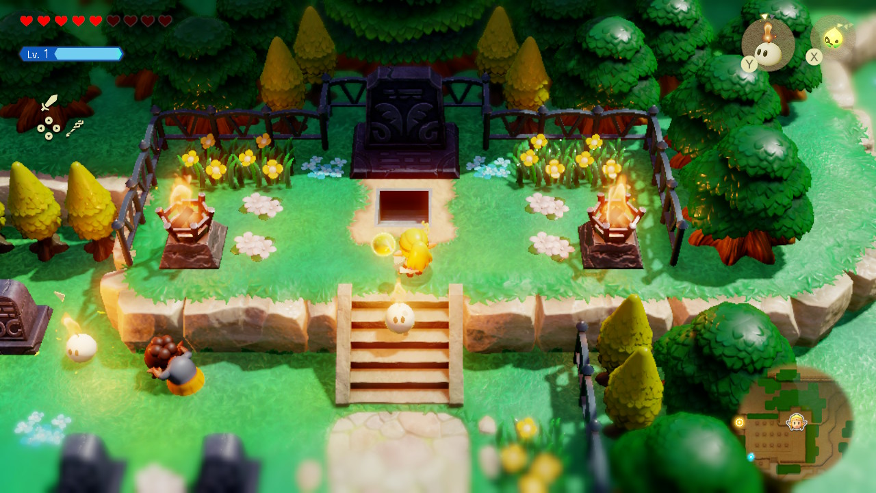 Zelda stands at the entrance to Graveyard Cave, where a golden egg lies in Zelda Echoes of Wisdom