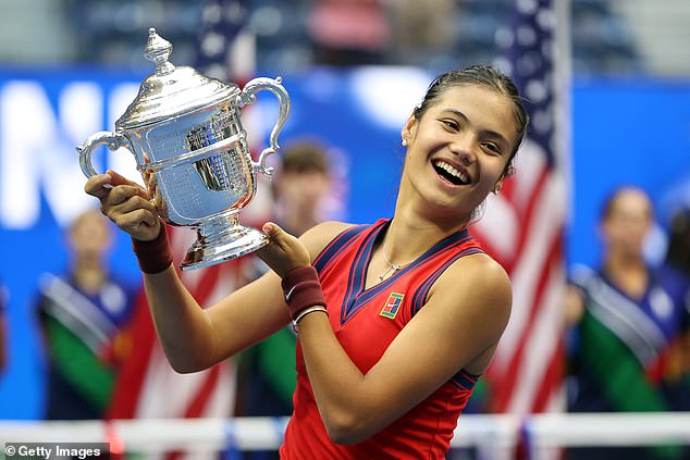 Emma Raducanu celebrates with the championship trophy after defeating Leylah Annie Fernandez during the women's singles final match on day thirteen of the 2021 US Open