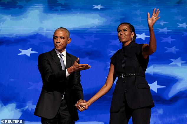 Former first couple Barack and Michelle Obama on stage at the Democratic National Convention in Chicago in August. DailyMail.com polls showed their support for Harris had the biggest effect