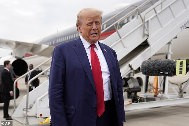 Republican presidential candidate, former President Donald Trump, speaks to reporters as he arrives at Augusta Regional Airport to visit areas affected by Hurricane Helene, Friday, Oct. 4, 2024, in Augusta, Georgia.