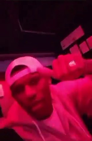 A video showed Robert Arboleda throwing money at a woman in the nightclub