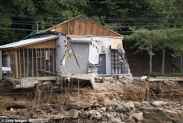 A flood-damaged pottery tools business in the aftermath of Hurricane Helene on October 3 in Bat Cave, North Carolina