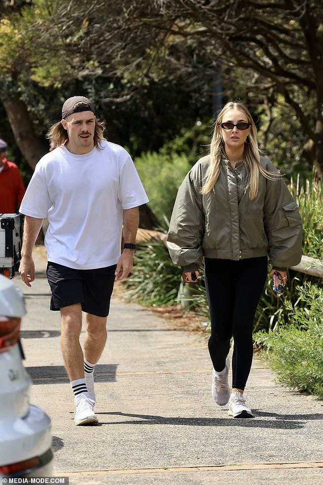 The Melbourne Storm star showed no signs of nerves ahead of the NRL Grand Final as he took a walk with his influencer girlfriend