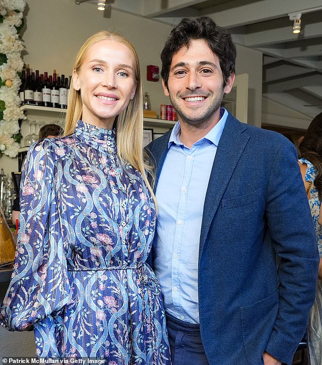 Warren pictured with his wife Martyna Sokol, who married shortly before being elected mayor in 2019 at the age of 36