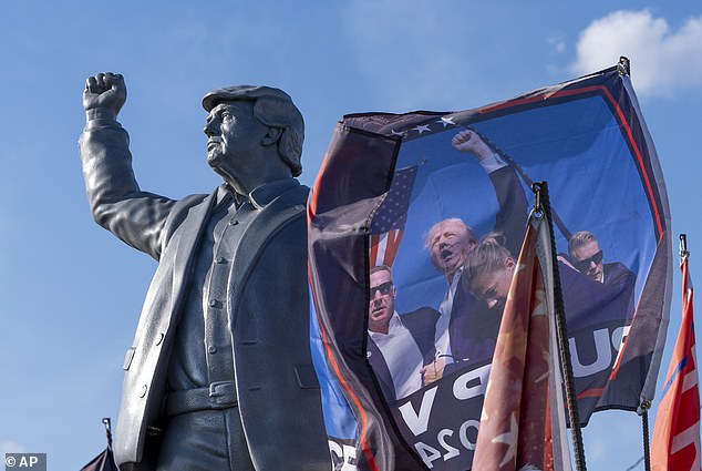 A statue of former Republican presidential candidate Donald Trump is placed on a truck ahead of a campaign event at the Butler Farm Show, Friday, Oct. 4, 2024, in Butler, Pennsylvania