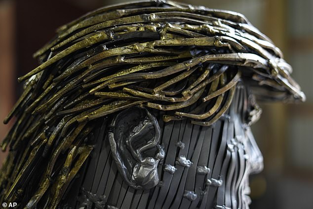 A detail of the ear on a sculpture of Republican presidential candidate Donald Trump in Butler, Pennsylvania