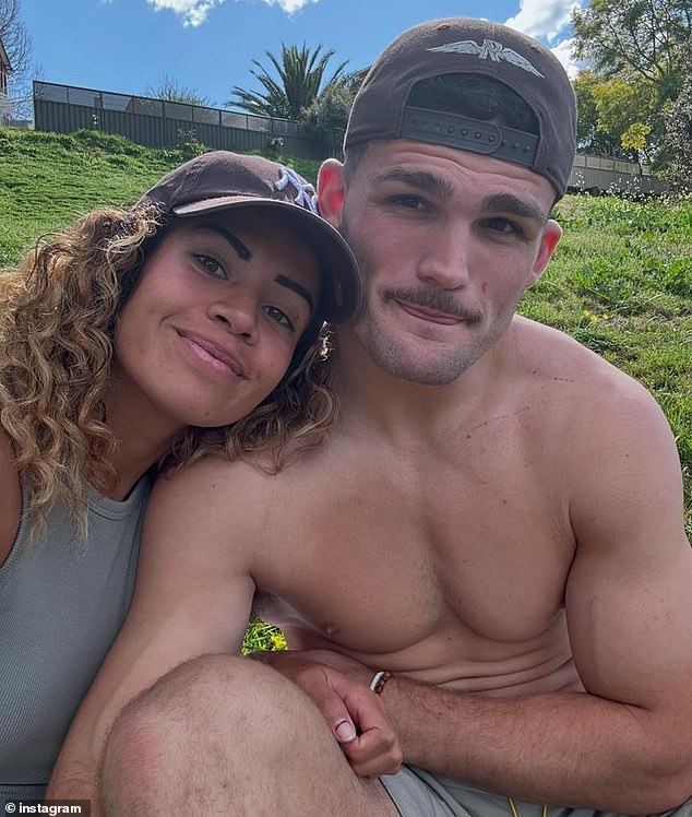 The Panthers halfback, 26, will certainly be the target of Melbourne Storm attackers when he is in the defensive line after appearing to aggravate the injury in the preliminary final win against Cronulla (pictured, with girlfriend Mary Fowler)