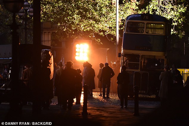 Bright orange lights and smoke were seen coming from the area to mimic the flames as the cast filmed at night