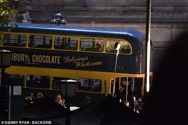 A large green double-decker bus was also seen on set, but lead actor Cillian Murphy was not spotted