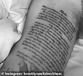 Brooklyn had his huge wedding vow adorned below his bicep.