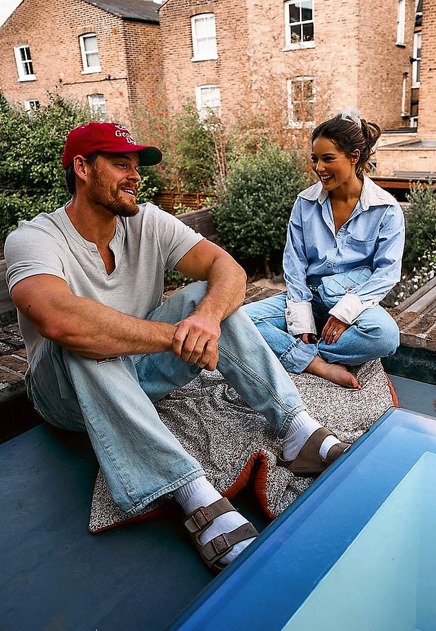 Louise and Ryan on the roof terrace of their London home