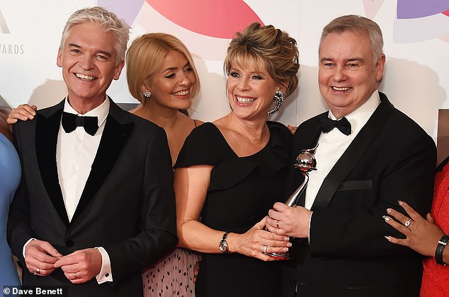 On Monday, Eamonn angrily lashed out at Phillip ahead of his TV comeback, saying he's 'very proud that he threw him under the bus' (pictured with Ruth and Holly Willoughby in 2019)