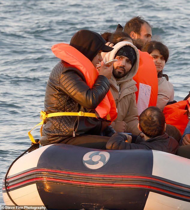 Some wore designer clothes, including an Icono Couture hoodie. And they were also on their iPhones, presumably to keep smugglers in France informed of the progress of their journey