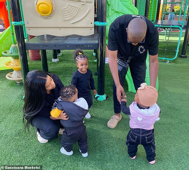 The twins' big sister Cute (center) is always 'happy to be around them' - and loves playing with her siblings