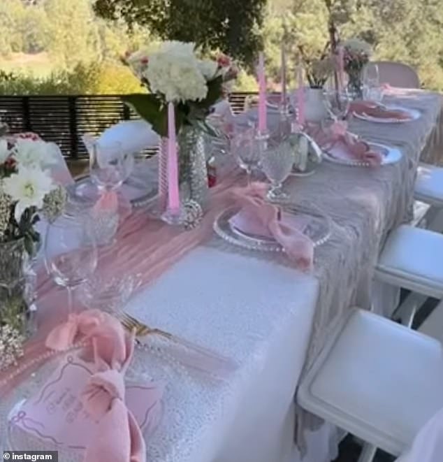 Jennie then showed her followers a look at the decorations outside, which consisted of a long, rectangular table topped with a white tablecloth, pink napkins and candles.