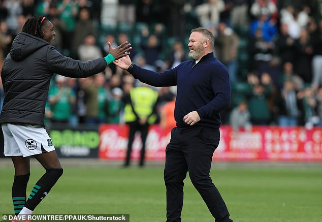 But Rooney was celebrated at full-time after his team scored a late winner to triumph 2-1