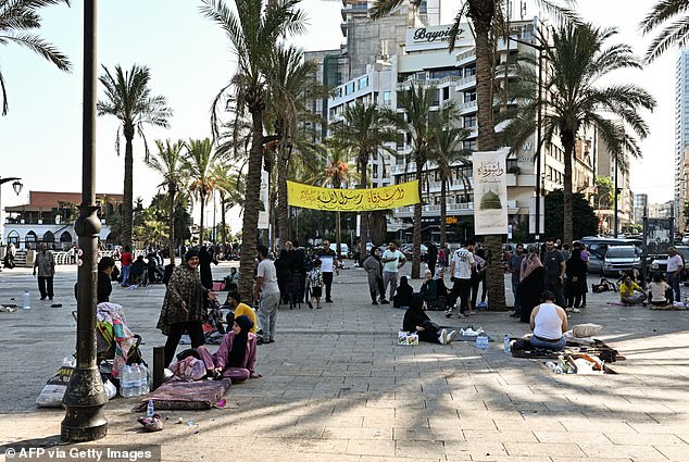 The waterfront promenade of Corniche Beirut is full of people with nowhere to go