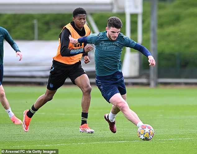 Obi-Martin (left, with Declan Rice) made several notable scoring runs for the Gunners youth team