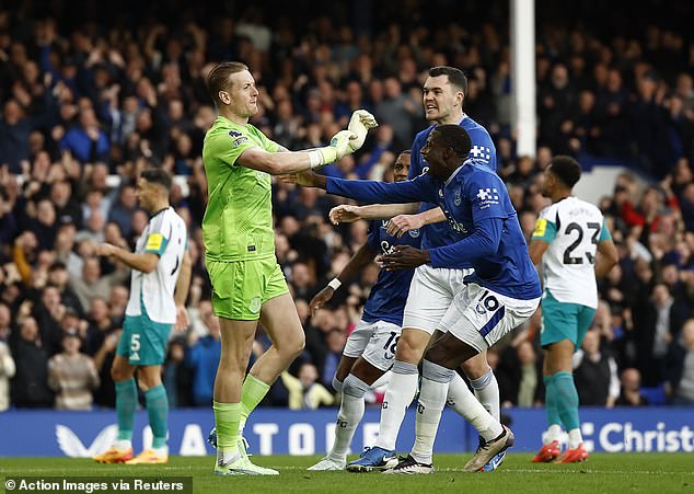 Pickford was congratulated by his Everton teammates after denying Gordon from the spot