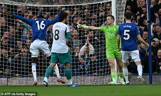 No. 16 Abdoulaye Doucoure seemed particularly delighted after Pickford's penalty save