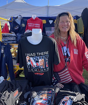 Pam Olthof, a Trump-themed vendor who was at the rally in July, was back, selling a completely revamped line of merchandise. Her best-selling item this time is a shirt with the date of both rallies in Butler with the image of Trump shaking his fist