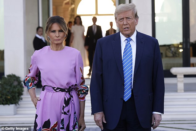 Melania has debunked speculation that the gesture was indicative of the state of her marriage, attributing it to logistical issues