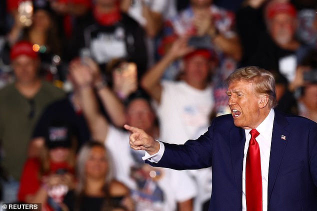 Republican presidential candidate and former US President Donald Trump gestures during a rally at the site of his July assassination attempt in Butler, Pennsylvania, US, October 5, 2024