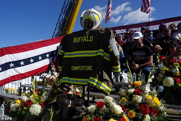 A memorial for firefighter Corey Comperatore, who died during an assassination attempt on Republican presidential candidate and former U.S. President Donald Trump, seen prior to a campaign rally with President Trump at the Butler Farm Show in Butler, Pennsylvania