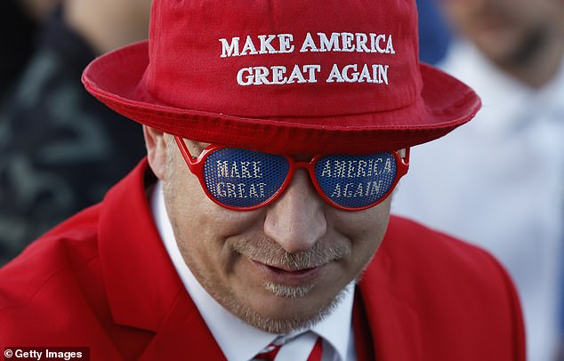 An attendee waits in line ahead of a rally for Republican presidential candidate, former U.S. President Donald Trump, at the Butler Farm Show Inc. on October 5, 2024 in Butler, Pennsylvania