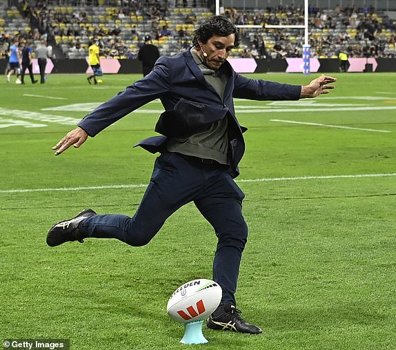 TOWNSVILLE, AUSTRALIA – SEPTEMBER 14: Former NRL player and television commentator Johnathan Thurston kicks a goal before the NRL Qualifying Final between North Queensland Cowboys and Newcastle Knights at Queensland Country Bank Stadium on September 14, 2024 in Townsville, Australia. (Photo by Ian Hitchcock/Getty Images)