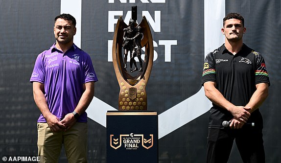 The Storm's Jahrome Hughes and the Panthers' Nathan Cleary are presented on stage ahead of the NRL Grand Final press conference in Sydney, Thursday, October 3, 2024. The Penrith Panthers will play the Melbourne Storm in the 2024 NRL Grand Final. ( AAP Image/Dan Himbrechts) NO ARCHIVING